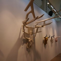 Series of skull-like sculptures by MadeIn, Wang Xieda, Liu Chuyun, Liu Weijian, Lin Tianmiao, Qiu Zhijie, Yuan Yuan, and Qiu Xiaofei. James Cohan Gallery booth.