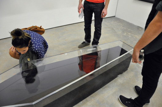 Oil Painting; Coffin (Long Stay) 2012, 190 x 60 x 45 cm, Recycle Engine Oil, Perspex (Courtesy of the Artist and Encounter Contemporary)