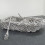 Yayoi Kusama, “Walking on the Sea of Death,” sewn stuffed fabric, fiberglass rowboat, silver paint, 58 x 256 x 158 cm, 1981.