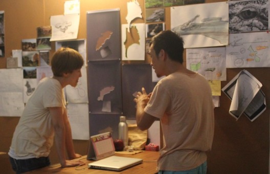 Sàn Art Lab artist Le Phi Long, meeting with his talking partner – artist Tiffany Chung – in his studio; April 2014 (image courtesy Sàn Art)