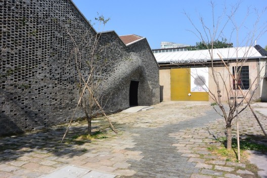 Pond Society and Qiao Space, the temporary space of collector Qiao Zhibing pending the opening of his new museum nearby in former oil tanks.