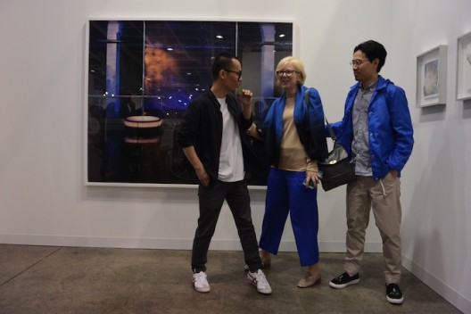 Jiang Pengyi, Karen Smith and Chen Wei, in front of Chen Wei's work, at Blindspot (Hong Kong)