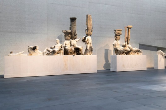 XU ZHEN®: ETERNITY VS EVOLUTION installation view featuring Eternity - Longxing Temple Buddha Statue Part Three, Tang Dynasty Buddha Statue, Longxing Temple Buddha Statue Part Five, Northern Qi Amitabha Statue, Vairochana, the Cosmic Buddha, Hebei Northern Qi Dynasty Standing Buddha Torso, Parthenon East Pediment, 2013-14
