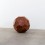 Ai Weiwei, untitled (wooden ball), Huali wood, ø 65 cm, 2010 (No. 18) [courtesy: the artist and Galerie Urs Meile, Beijing-Lucerne]. 艾未未, 《untitled (wooden ball)》, 木, 直径65 cm, 2010 (No. 18) [图片：艾未未和麦勒画廊]。