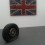 front: Gavin Turk, "Flat Tyre", 2013 (GBP 40,000)back: Willem Boshoff, "Flag I", 2003, available at Goodman Gallery, Johannesburg (GBP 55,000)