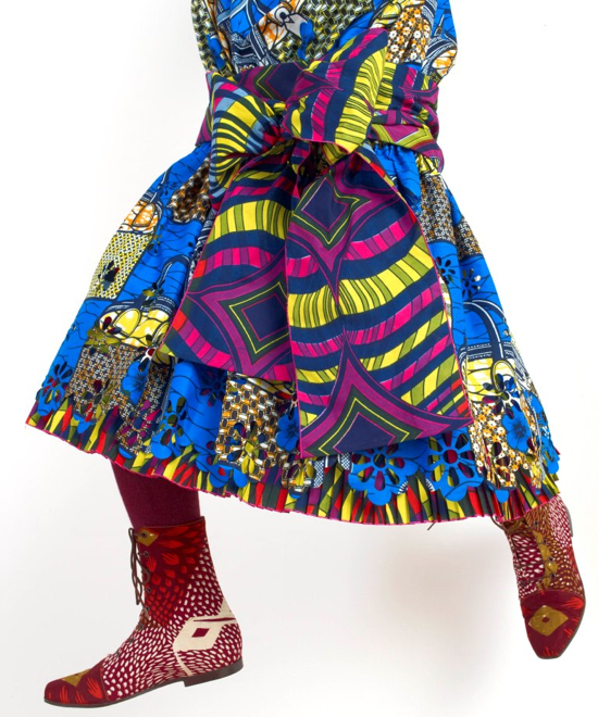 Yinka Shonibare MBE, Champagne Kid 6, unique life-size mannequin, Dutch wax printed cotton textile, leather, resin, chair, globe and Cristal champagne bottle, 178 x 85 x 76cmcm, 2013