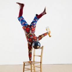 Yinka Shonibare MBE, Champagne Kid 7, unique life-size mannequin, Dutch wax printed cotton textile, leather, resin, chair, globe and Cristal champagne bottle, 178 x 85 x 76cmcm, 2013