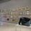 57 drawings by Joseph Yoakum installed on a gallery wall, in front of them is a Vincent Fecteau sculpture展墙上是Joseph Yoakum的57幅画作，前景是Vincent Fecteau的雕塑