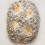 Johan Creten, "Hong Kong Fireworks", mat and shiny gold luster on majolica glazed stoneware, 104 x 78 x 26 cm, 2014 (Photo: Joyce Yung; © Creten / ADAGP, Paris & Sack, Seoul, 2014; image courtesy Galerie Perrotin)