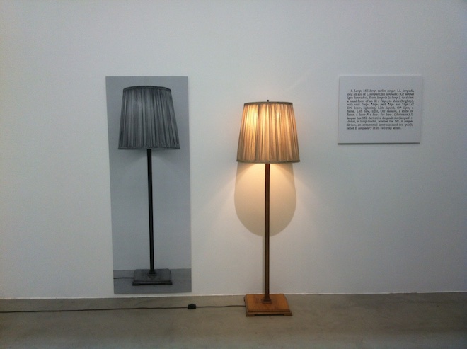 Joseph Kosuth “One and Three Lamps”, 2 black and white photographs mounted on board, lamp, dimensions variable, 1965 (copyright Joseph Kosuth/ ARS, New York; courtesy: the artist and Sprüth Magers, Berlin, London).