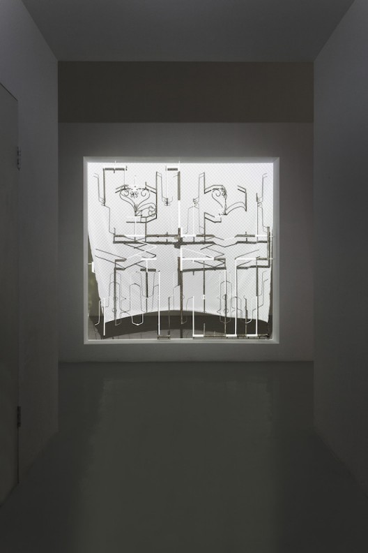Liu Chuang, What is A Screen?, 2015, Installation, Iron, paint, projection, electric fan, printed cloth, 220×210cm, Courtesy the artist and Magician Space