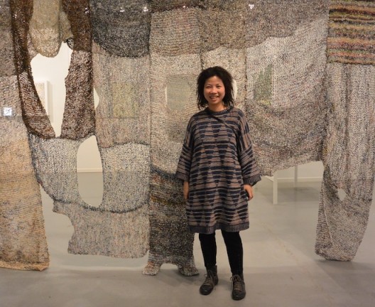 Movana Chen with her knitted shirts of shredded magazines, at Australia China Art Foundation (ACAF), Shanghai