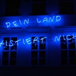 Libia Castro & Ólafur Ólafsson, DEIN LAND EXISTIERT NICHT, 2013 (from the ongoing campaign YOUR COUNTRY DOESN’T EXIST, since 2003), neon sign, 190 x 700 cm, Installation view, courtesy Libia Castro & Ólafur Ólafsson