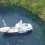TBA21考察船Dardanella固定在了巴布亚新几内亚，米尔恩湾的蒂娜海滩（图片由TBA21提供）/ The TBA21 research vessel Dardanella anchored at Dina’s beach, Milne Bay, Papua New Guinea. Courtesy TBA21.
