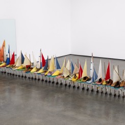 Francis Alÿs, Untitled (Study for Don't Cross the Bridge Before You Get to the River), 2006-2009. Installation composed of one painting, 36 Shoe-Boats, and one mirror. Approximate dimensions: 47 1/4 x 39 3/8 x 128 1/8 inches (120 x 100 x 325.4 cm)