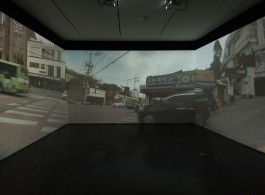 Passage/s: The Pram Project, 2015, three-channel video, dimensions variable. Installation view, Contemporary Arts Center Cincinnati. Photo by Tony Walsh. Courtesy the artist, Lehmann Maupin, New York and Hong Kong, and Contemporary Arts Center Cincinnati.