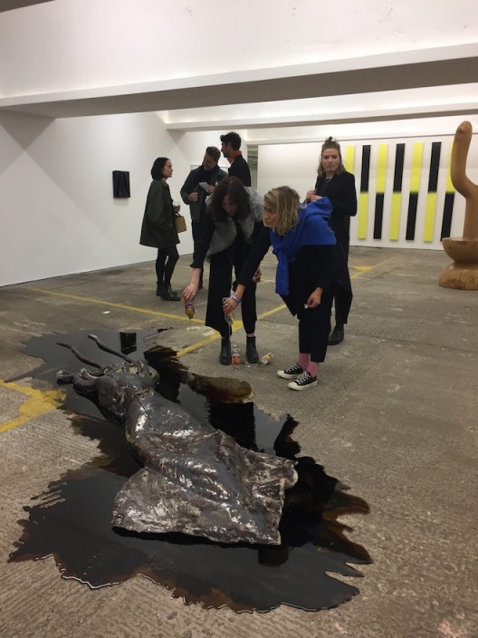 David Zink Yi's squid has a drink at the opening of König Archiv & Souvenir in the converted carpark of Winchester House, Marylebone Road.