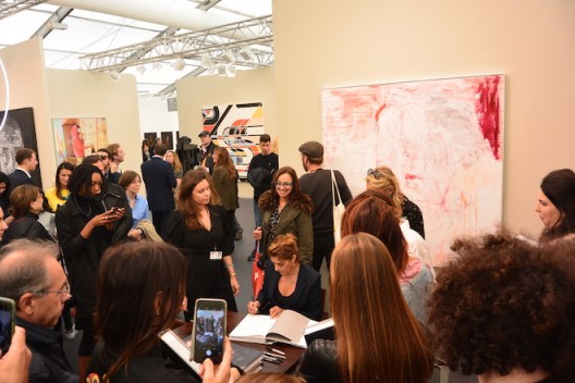 Tracey Emin signing books at White Cube