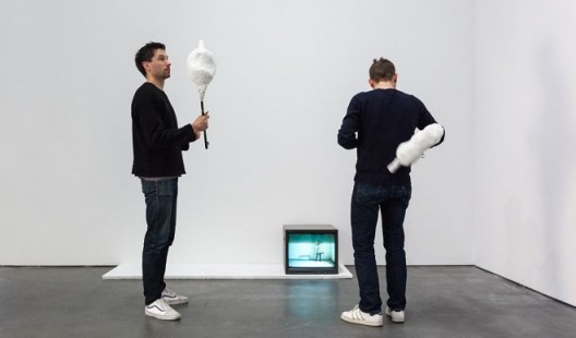 Viewers interacting with Franz West, Passstücke (mit Video mit Verwendungstips) (Adaptives [with Video with Usage Tips]), 1996, during the exhibition Franz West at David Zwirner, New York, 2014. © 2018 Archiv Franz West